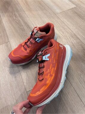 Salomon Women’s Orange Trail Running Shoes with Light Blue Accents